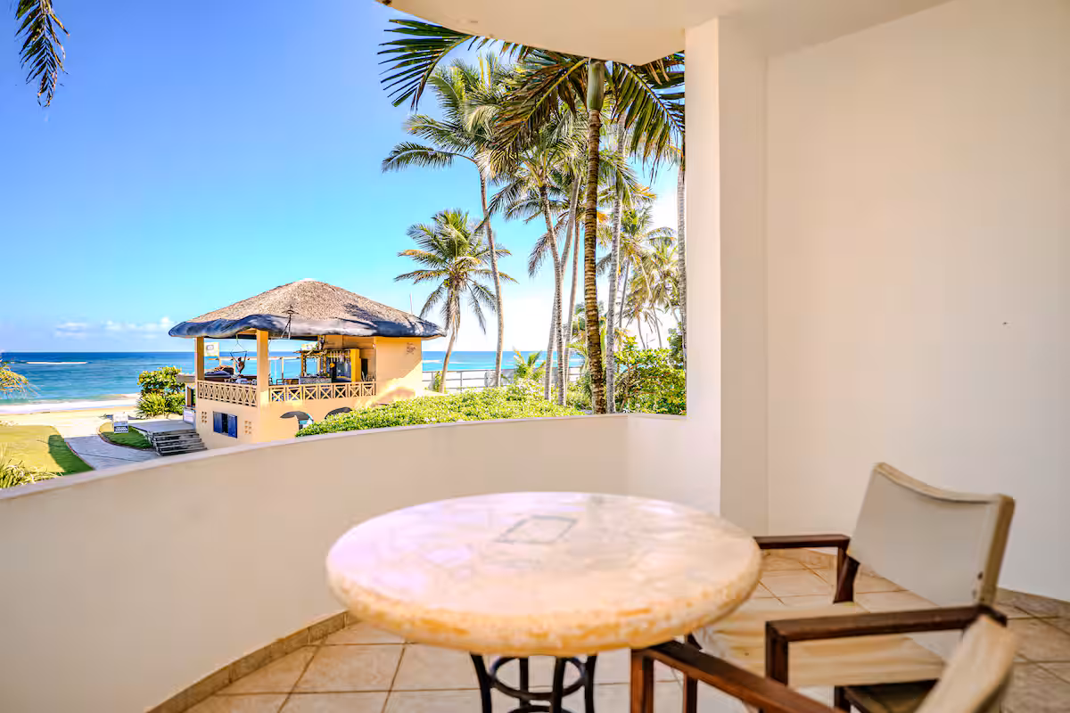 Bright Beachfront Junior Suite With Balcony and Ocean Breeze