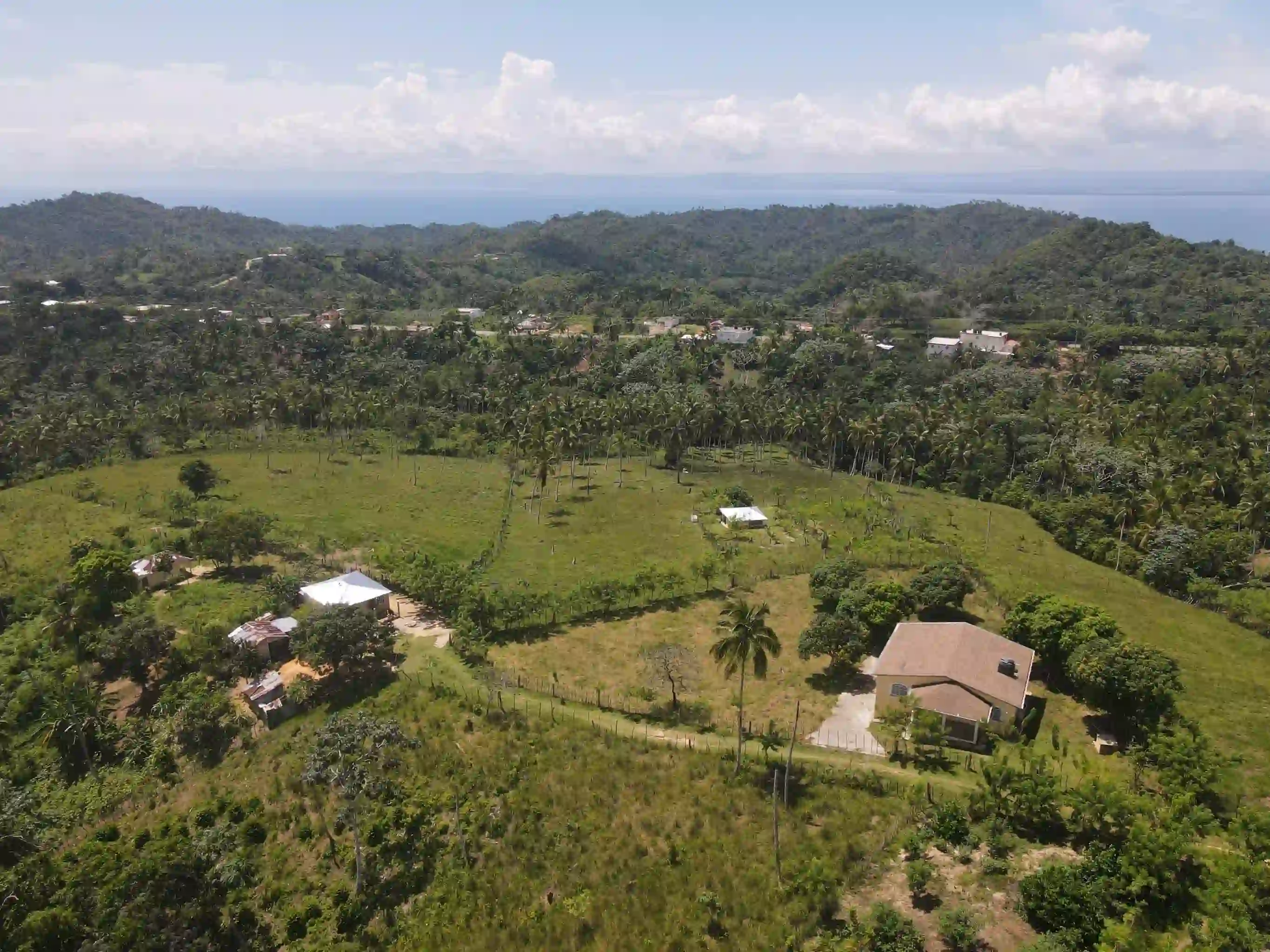 Flat building lot in a quiet village with a view to the Samana Bay